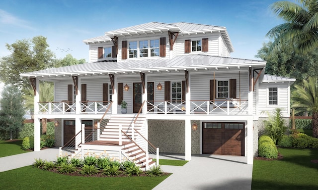 view of front of home featuring covered porch and a garage