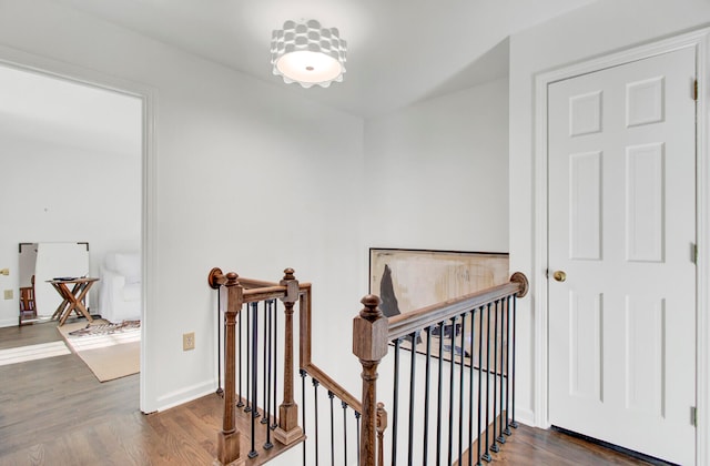 stairway with wood-type flooring