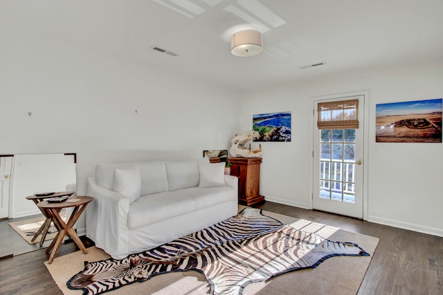 living room featuring dark hardwood / wood-style floors