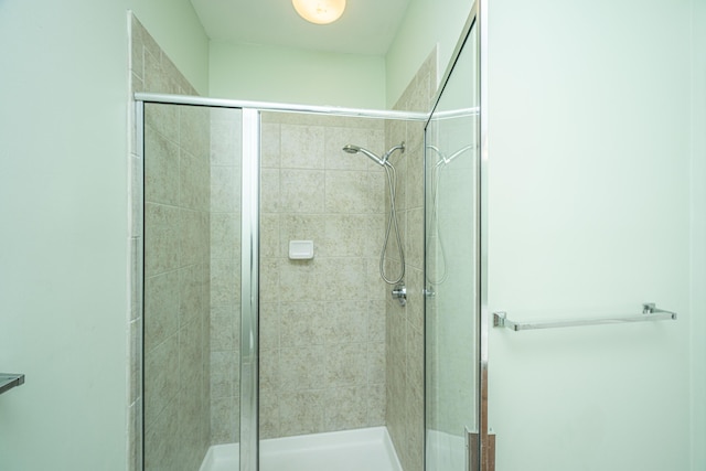 bathroom with a stall shower