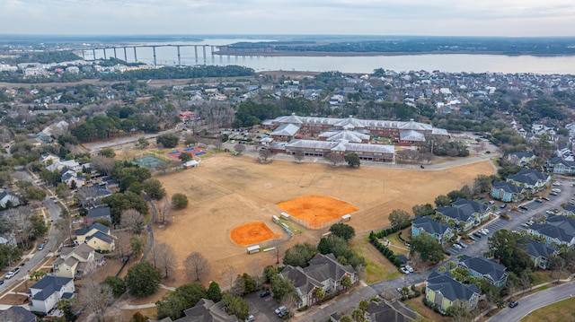 bird's eye view featuring a water view and a residential view