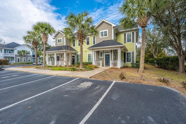 view of front of house featuring uncovered parking