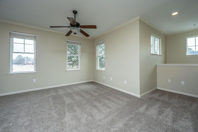 carpeted spare room featuring baseboards, ornamental molding, a ceiling fan, and recessed lighting