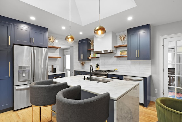 2605 Mona Ave, Charleston, SC 29414 - kitchen featuring open shelves, appliances with stainless steel finishes, a sink, blue cabinetry, and tasteful backsplash