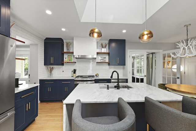 2605 Mona Ave, Charleston, SC 29414 - kitchen with blue cabinets, a sink, appliances with stainless steel finishes, open shelves, and a breakfast bar