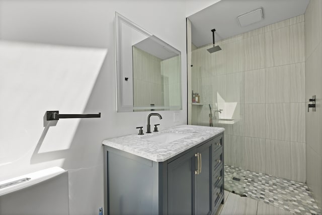 2605 Mona Ave, Charleston, SC 29414 - full bath featuring vanity, tiled shower, and toilet