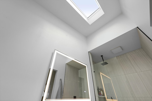 2605 Mona Ave, Charleston, SC 29414 - interior space with a skylight, a tile shower, and lofted ceiling