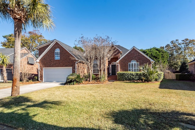 front facade featuring a garage and a front lawn