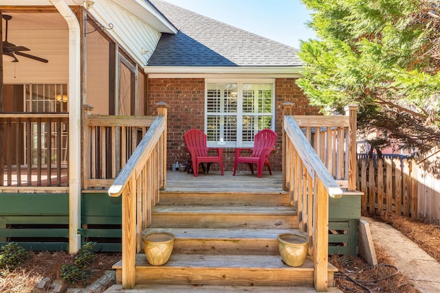 wooden terrace featuring ceiling fan