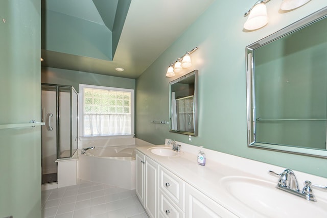 bathroom featuring tile patterned flooring, vanity, and independent shower and bath