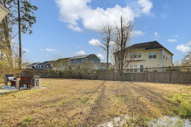 view of yard with a patio and fence