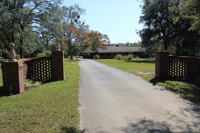 view of street featuring driveway