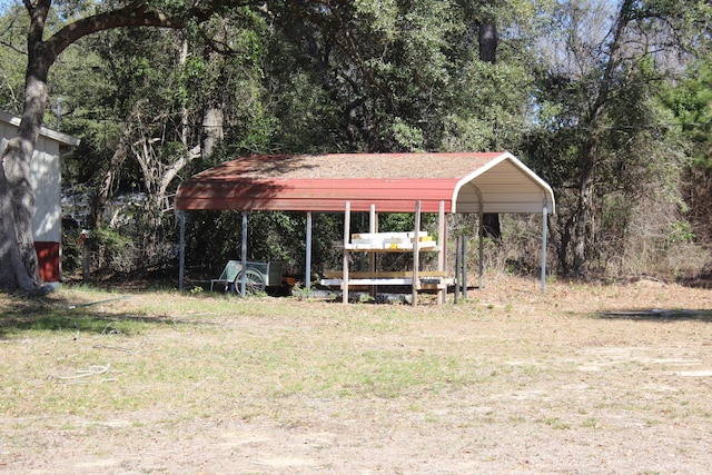 view of yard with a detached carport