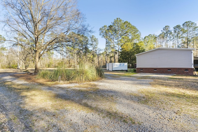 view of road featuring driveway