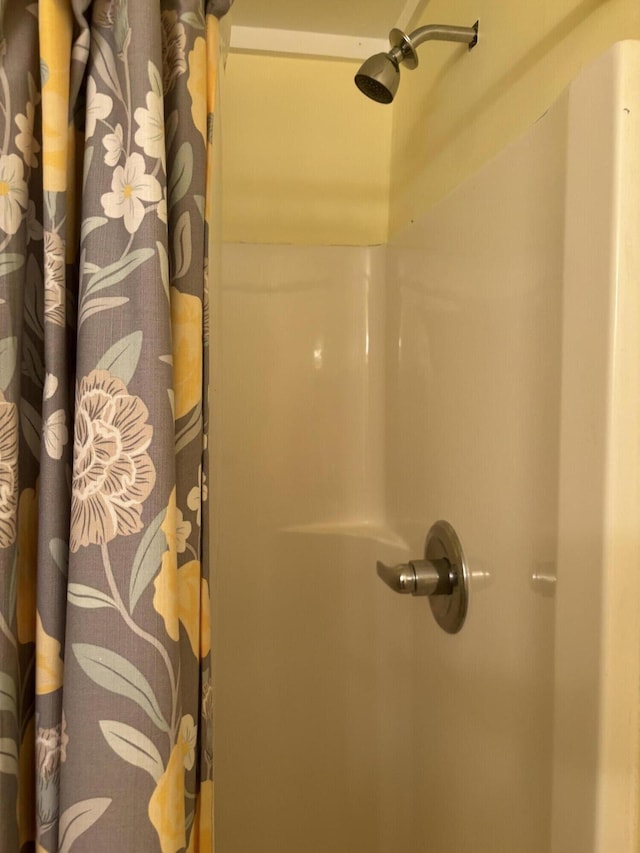 bathroom featuring curtained shower