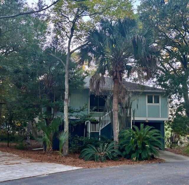 view of side of property featuring a carport