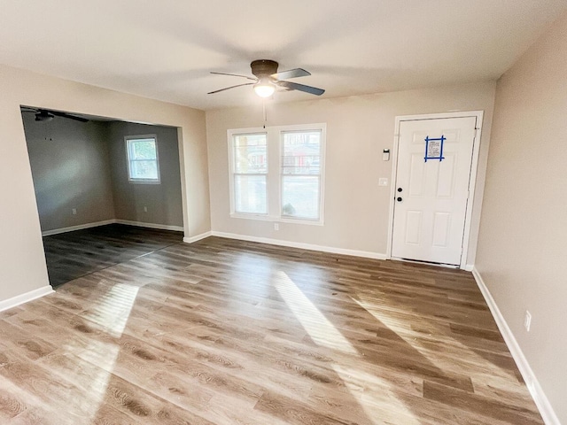 foyer entrance featuring hardwood / wood-style floors and ceiling fan