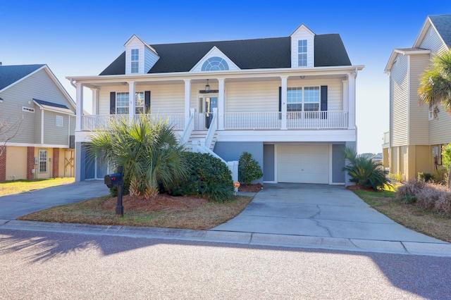 view of front of property featuring a garage and covered porch