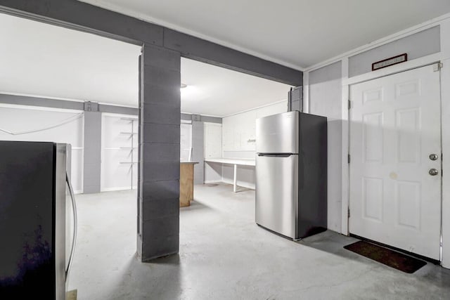 kitchen featuring stainless steel fridge