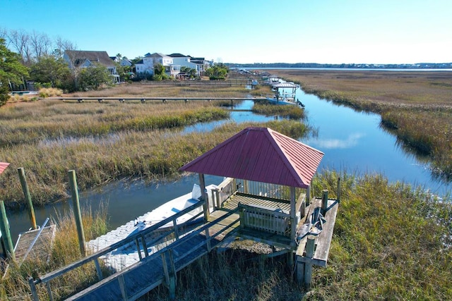 dock area featuring a water view