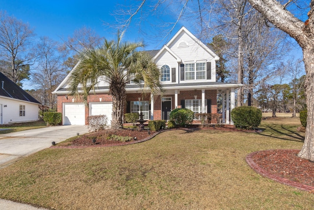 view of front of home with a garage, a porch, and a front yard