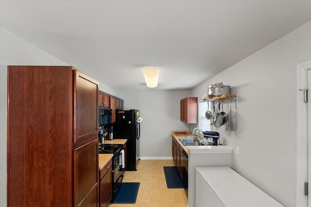 1170 Deerberry Rd, Hanahan, SC 29410 - kitchen featuring black appliances, light countertops, light flooring, and a sink