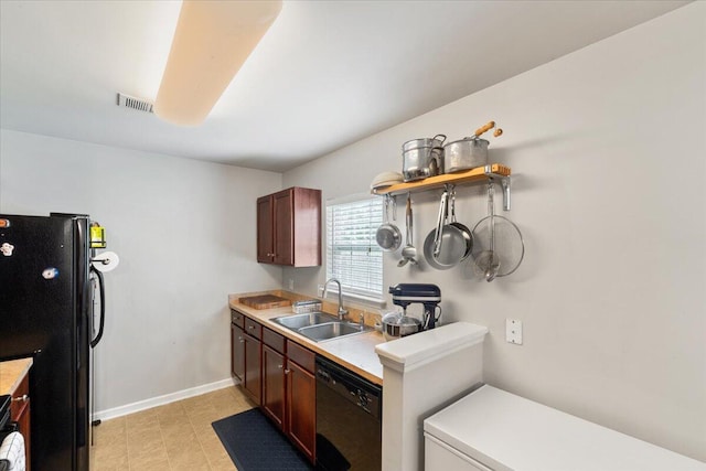 1170 Deerberry Rd, Hanahan, SC 29410 - kitchen with a sink, black appliances, light countertops, and baseboards