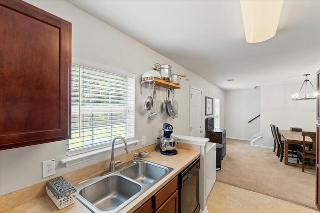 1170 Deerberry Rd, Hanahan, SC 29410 - kitchen with a sink, dishwasher, light colored carpet, a chandelier, and light countertops