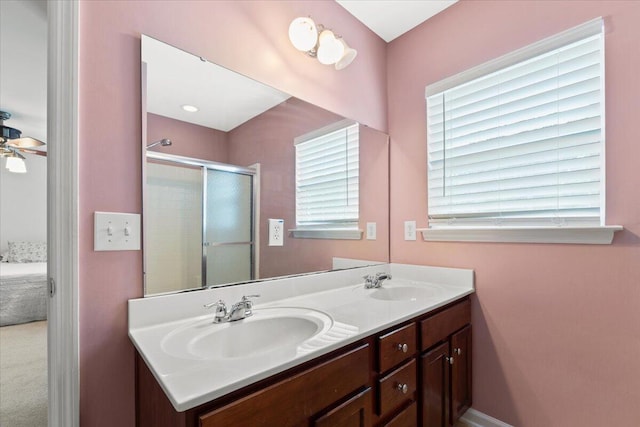 1170 Deerberry Rd, Hanahan, SC 29410 - ensuite bathroom featuring double vanity, a shower with shower door, and ceiling fan