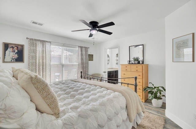 100 Runnels Cv, Summerville, SC 29485 - bedroom with baseboards, wood finished floors, and ceiling fan