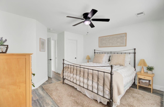 100 Runnels Cv, Summerville, SC 29485 - bedroom with wood finished floors, baseboards, and ceiling fan