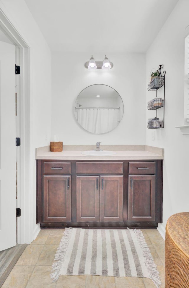 100 Runnels Cv, Summerville, SC 29485 - bathroom with vanity and baseboards