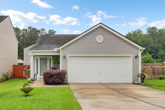 100 Runnels Cv, Summerville, SC 29485 - view of front of property featuring concrete driveway, an attached garage, and roof with shingles