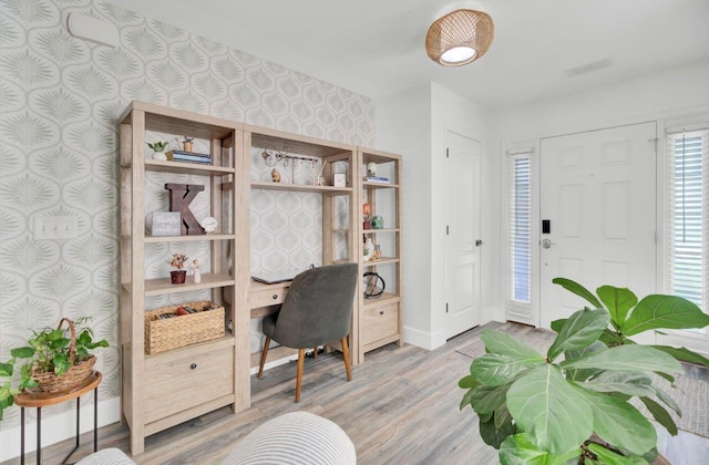 100 Runnels Cv, Summerville, SC 29485 - home office featuring wallpapered walls, light wood-style floors, and baseboards