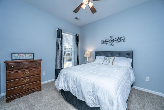 bedroom featuring carpet, visible vents, and baseboards