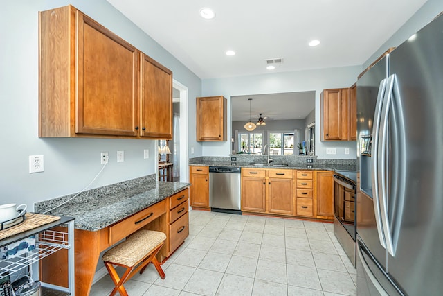 kitchen with recessed lighting, visible vents, appliances with stainless steel finishes, and brown cabinetry