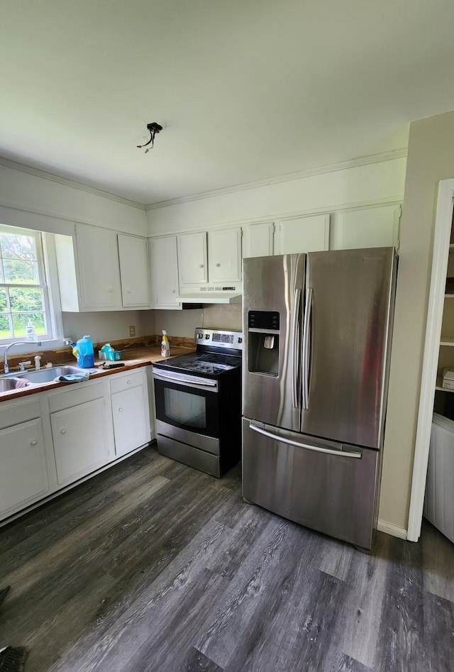 kitchen featuring sink, white cabinetry, dark hardwood / wood-style flooring, and stainless steel appliances