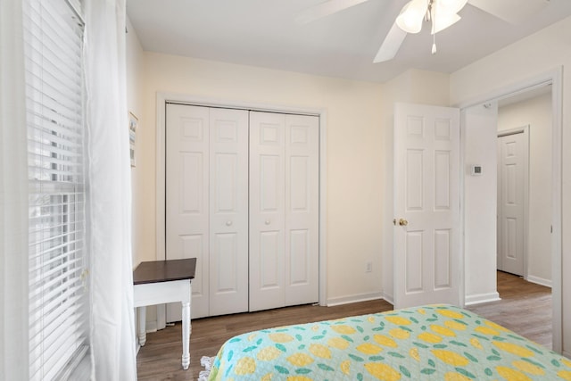 unfurnished bedroom featuring ceiling fan, hardwood / wood-style floors, and a closet