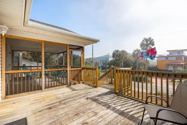 deck featuring a sunroom