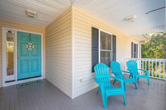 wooden deck featuring a porch