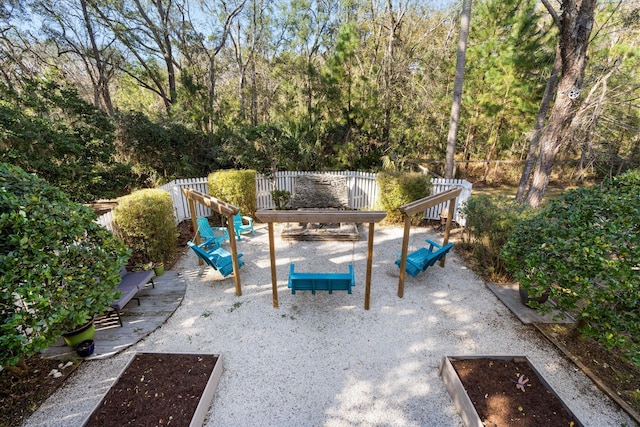 view of patio featuring fence