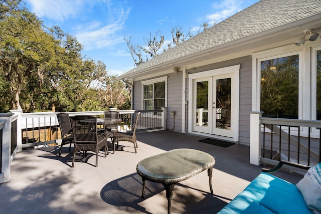 view of patio / terrace with french doors and outdoor dining area