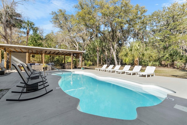 pool with a patio