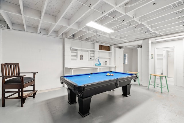 recreation room with finished concrete floors and pool table