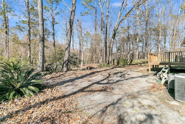 view of yard featuring a wooden deck