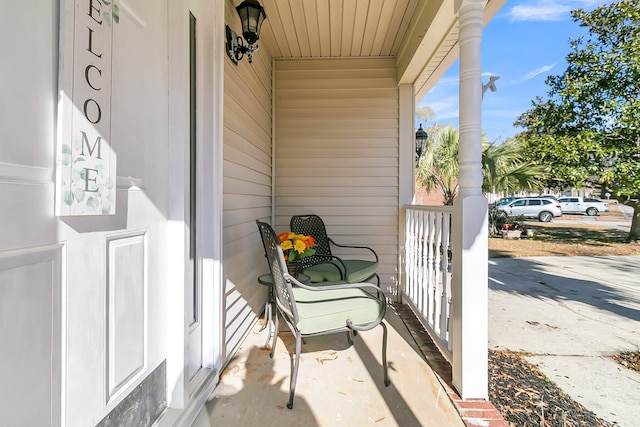 balcony featuring covered porch