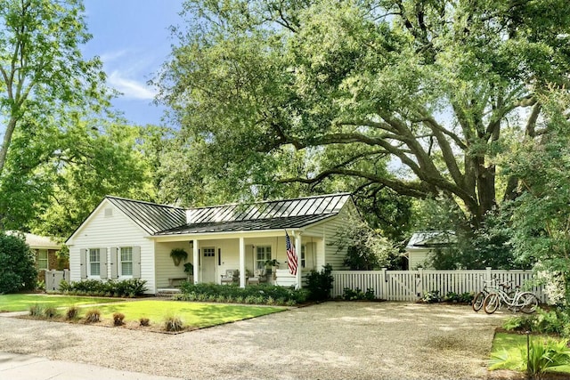 509 Klein St, Mount Pleasant, SC 29464 - single story home with a standing seam roof, covered porch, and a metal roof