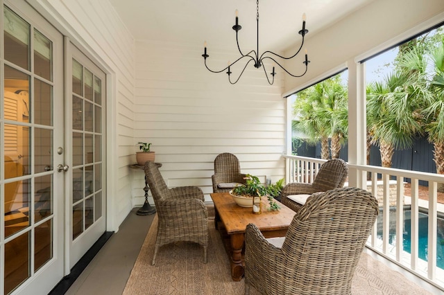 509 Klein St, Mount Pleasant, SC 29464 - sunroom with french doors and a chandelier