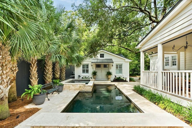 509 Klein St, Mount Pleasant, SC 29464 - swimming pool featuring an outdoor structure, an exterior structure, an in-ground hot tub, and a patio