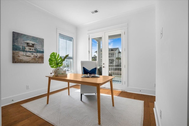 office area featuring french doors, wood finished floors, baseboards, and ornamental molding